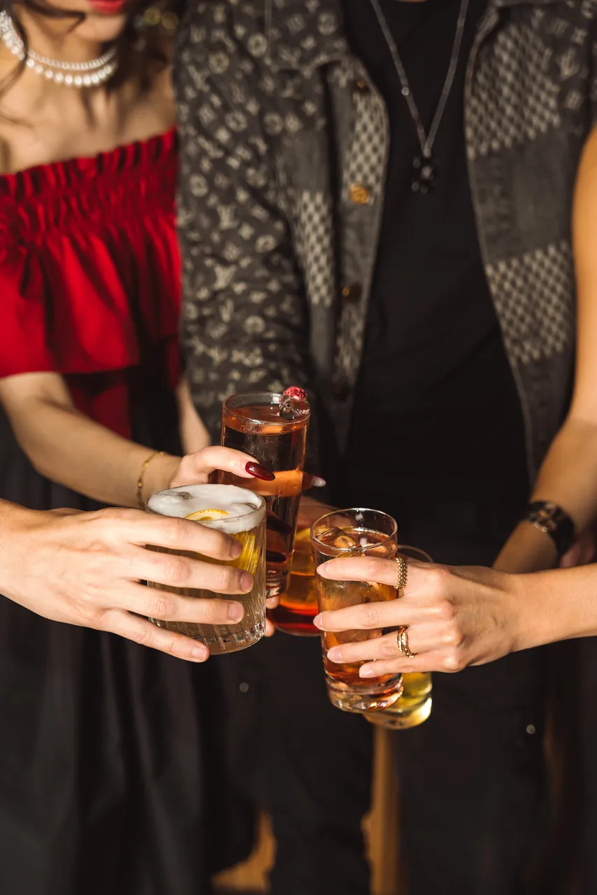 Guests toasting an array of cocktails